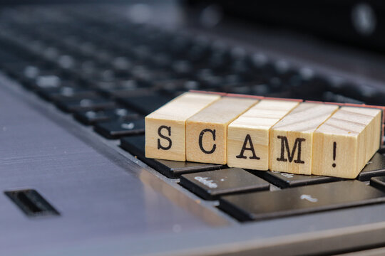 Digital scam concept written on cubes. design for phishing or fraud ideas.