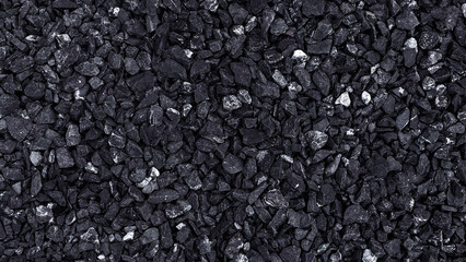 Small dark stone texture for background, ​​pattern of gravel stone wall texture or stone background