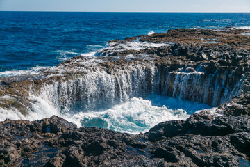 waterfall in a mountain in the ocean in the canary islands