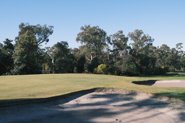 golf course course green in australia with sand bunkers