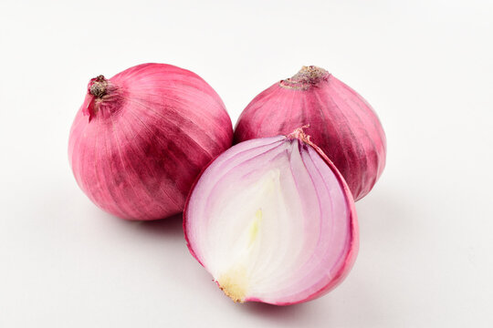 Raw onion isolated on white background