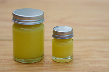 Bottles of homemade Thai herbal ointment. Concept, Thai local wisdom to use  fragrant medicinal herbs to make inhaler and massage balm.        