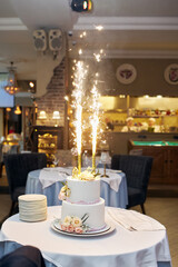restaurant table setting with flowers