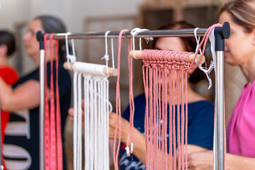 Macrame Workshop. Textile Crafters: Women Creating Macrame Treasures in Workshop