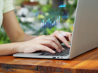 Business analytics, data and data management system with KPI. Businessman using laptop for business data. on the virtual window