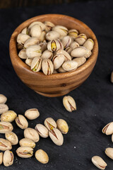a large number of salty and crispy pistachios close-up