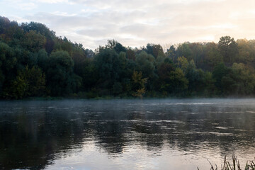 A little fog on the river in autumn