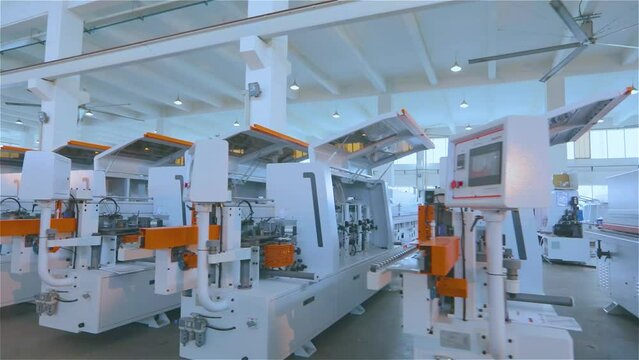 Warehouse of cnc machines at the factory. Production of cnc machines. Modern plant for the production of CNC machines. Woodworking machines