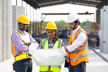 Professional Mechanical Engineer team Working on construction blueprints paper at Prefabricated concrete factory Heavy industrial. Product quality Inspection. Unity and teamwork concept