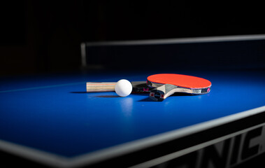 Tabletennis desk with rackets on it