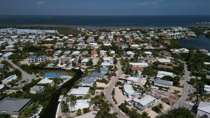 Aerial view of luxury real estate in the Florida Keys. Birds eye view of waterfront homes and oceanfront homes