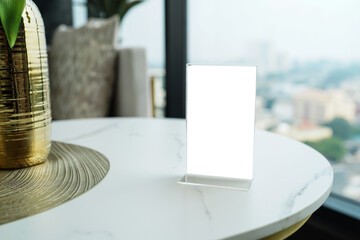 Menu mack up blank for text marketing promotion. Mock up Menu frame standing on wood table in restaurant space for text.