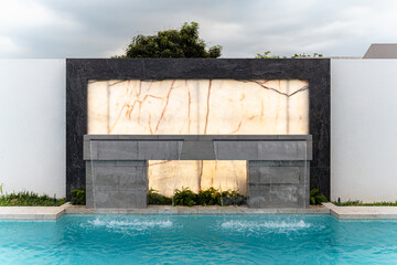 Exterior Pool waterfall with marble fountain Horizontal