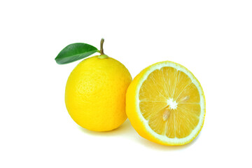 Lemon, sliced ​​​​in half, with fresh green leaves.  Isolated on a white background
