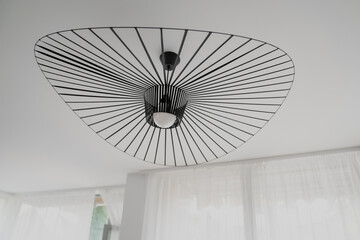 Modern interior design black lamp in minimalist style apartment
