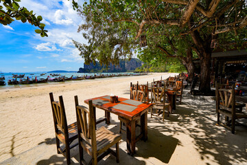 Outdoor beach restaurant in the sand of Railay West Beach in the Railay Peninsula in the Province of Krabi, Thailand, Southeast Asia