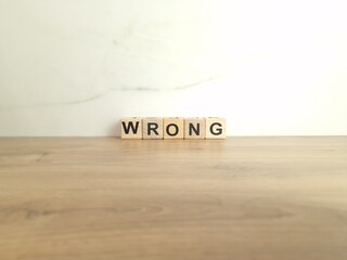 Word wrong made from wooden blocks