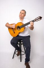 Obraz premium Full length portrait of Adult man playing guitar isolated on white background