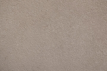 Plaster wall pattern texture in a cream color 