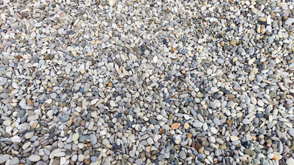 Gravel texture. Fine gray stone gravel. Natural textural background. Copy space and pattern
