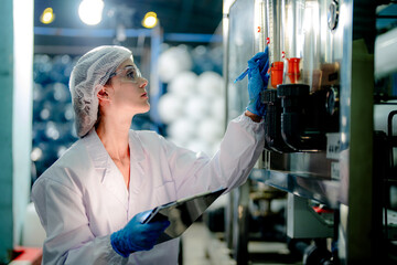 scientist worker checking the quality of Reverse osmosis machine system at the industrial factory....
