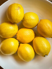 A flat lay image of a group of lemons.