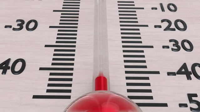 Macro shot of rising temperature in wooden thermometer. Animation showing the rising red temperature.