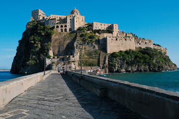 Aragonese Castle seen from the bridge to Ischia Island, at the northern end of the Gulf of Naples, Italy.