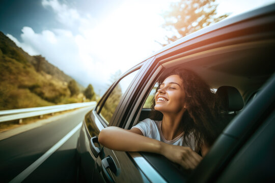 Generative AI illustration of happy carefree curly haired female traveler sitting in car on passenger seat with opened window while enjoying summer trip