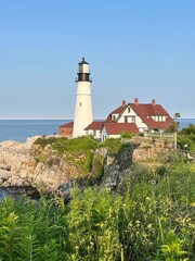 Fototapeta na wymiar Light house on the coast of Maine, USA