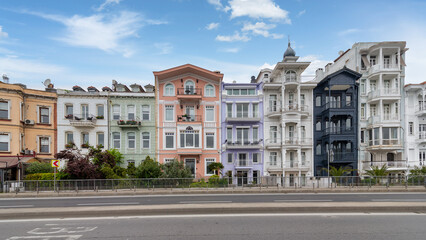 Colorful traditional residential buildings overlooking Bosphorus strait, in Arnavutkoy neighborhood, Besiktas district, Istanbul, Turkiye, in a sunny spring day