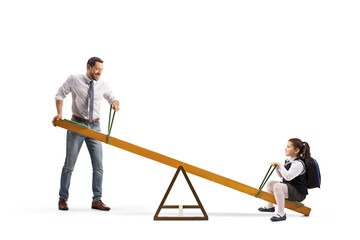 Father lifting a daughter on a seesaw