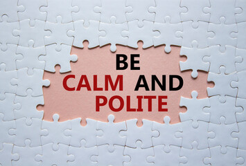 Be Calm and Polite symbol. Concept words Be Calm and Polite on white puzzle. Beautiful pink background. Business and Be Calm and Polite concept. Copy space