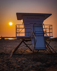 lifeguard tower at sunset