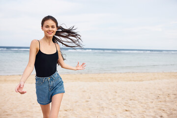 lifestyle woman beach smile young sunset sea happiness travel summer running