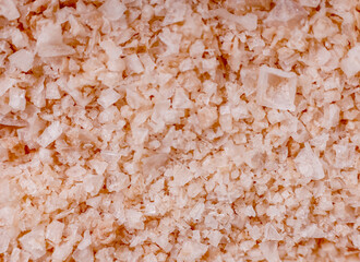 cloceup macro top view. natural rock salt rose colored flakes. Rare spice vegetarian concept