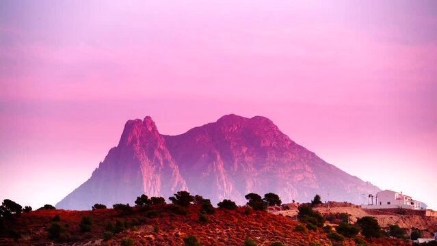 Timelapse. Peak Puig Campana at sunrise. Alicante province, municipality of Finestrat. View from Xarco coast.
