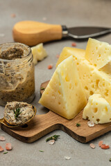 Pieces of delicious cheese with holes and truffle paste. vertical image. place for text