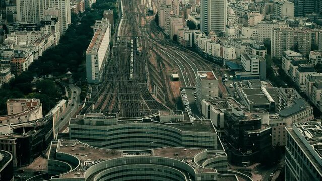 Trains and many railway tracks at Montparnasse terminus in in Paris, view from above. France