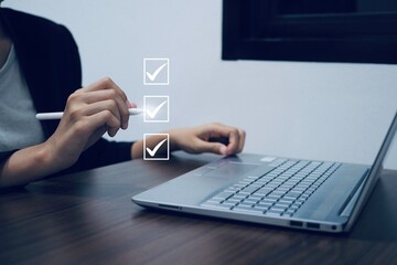 Businessman checking digital items for personal work in office.Document management and process...