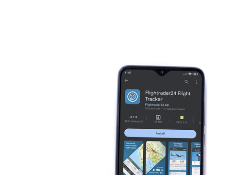 Flightradar24 Flight Tracker app play store page on smartphone on white background