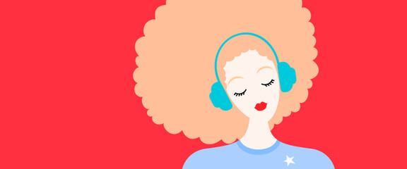 Fun curly haired girl in headphones