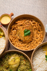 Red tomato sauce spaghetti with chicken Food buffet peruvian table Assorted dishes gourmet cuisine Peru traditional 