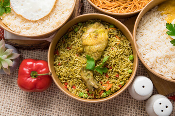 Arroz con pollo green rice with chicken Food buffet peruvian table Assorted dishes gourmet cuisine Peru traditional 