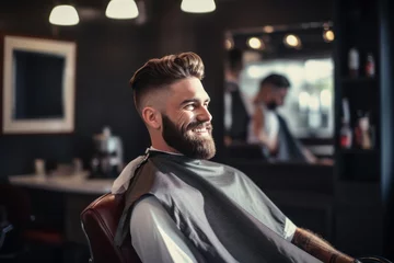 Fotobehang a handsome model man with a beard in the hairdresser barbershop salon gets a new haircut trim and style it. sitting on the chair and talks to the hairstylist barber. guy smiling. Generative AI © SayLi