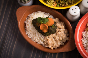 Seco con carne beef stew with white rice and beansFood buffet peruvian table Assorted dishes gourmet cuisine Peru traditional 