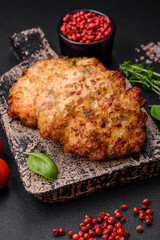 Delicious fresh fried minced chicken meat cutlets with salt, spices and herbs