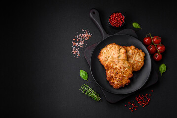 Delicious fresh fried minced chicken meat cutlets with salt, spices and herbs