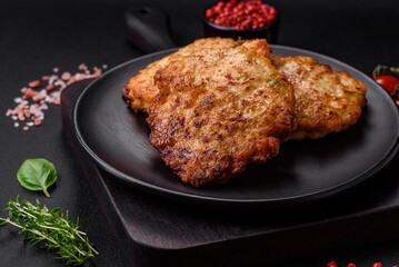Delicious fresh fried minced chicken meat cutlets with salt, spices and herbs