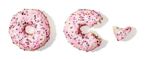 Bitten pink donut on white background